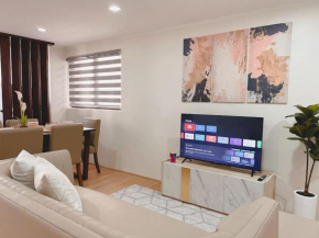 2BR spacious loft in QC, short walk to M Place